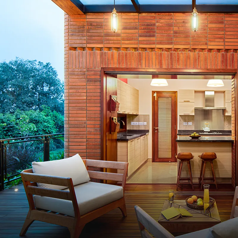 Total Environment After the Rain Kitchen leading out to a wooden deck